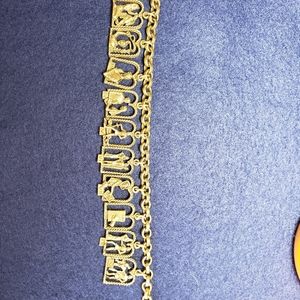 Vintage signed CGI.INC ten Commandments charm brac